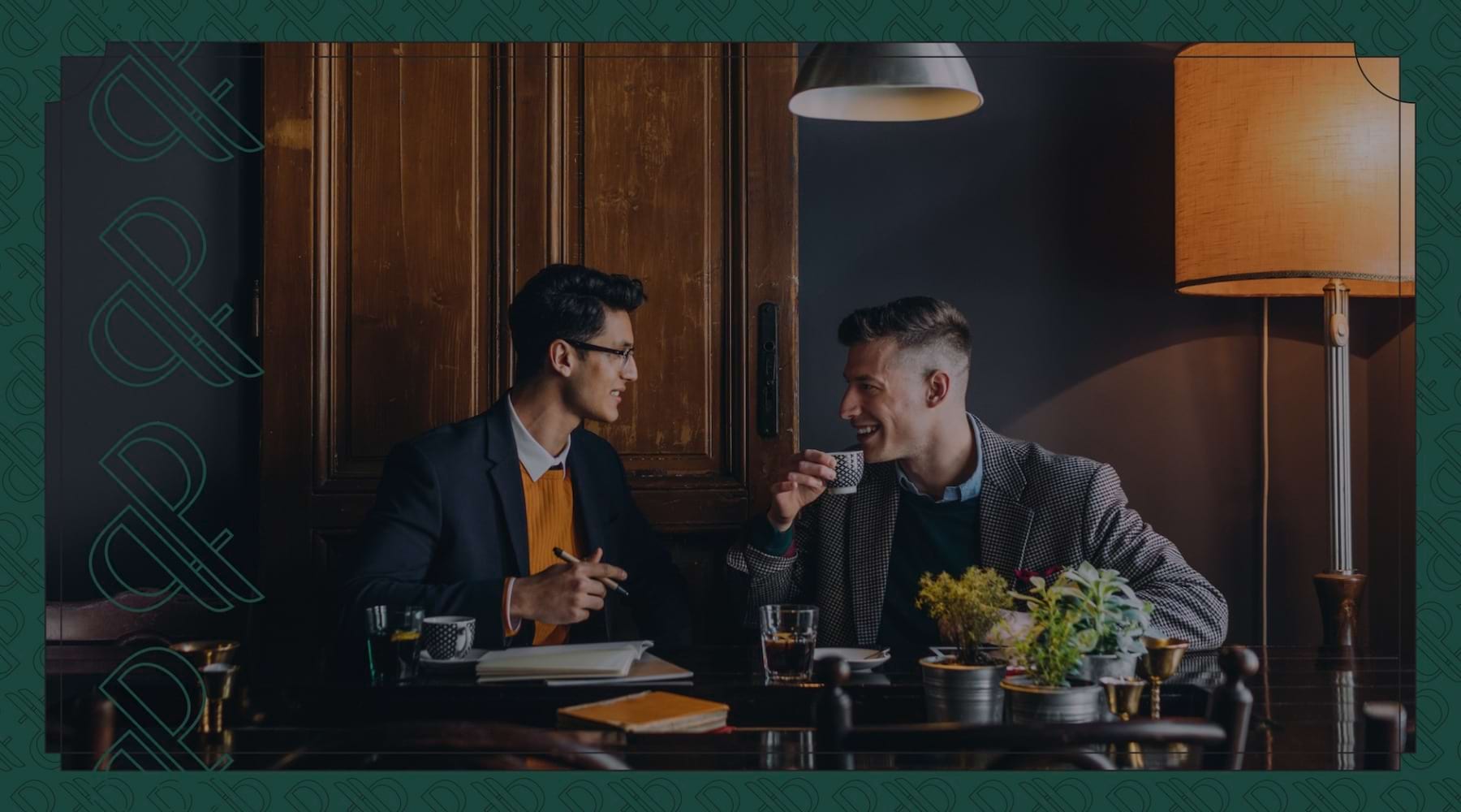 Live Connected two men sipping drinks in a cozy retail area